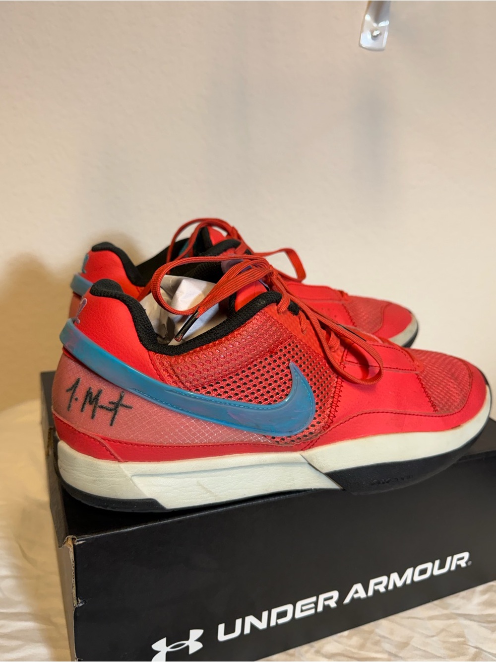 Men’s 10.5 Red Athletic Sneakers with Blue Swoosh Accent - Picture 4 of 6